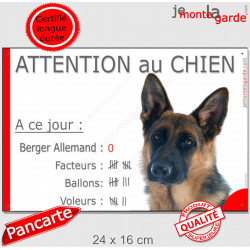 Berger Allemand poils courts, Pancarte Portail drôle "Attention au chien, nombre de voleurs facteurs, ballons" photo
