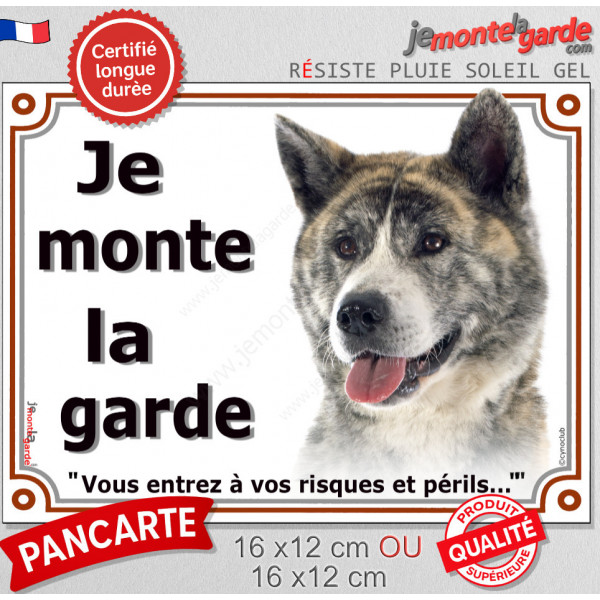 Akita Inu Japonais bringé, plaque portail "Je Monte la Garde, risques et périls" pancarte bringué attention au chien photo