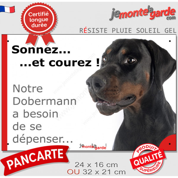 Pancarte portail Attention au Chien humour "Sonnez et courez, notre Dobermann noir et feu a besoin de se dépenser" photo