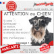 Schnauzer noir et blanc, plaque portail humour "Attention au Chien, Jetez Vous au Sol, attendez secours, courage" photo