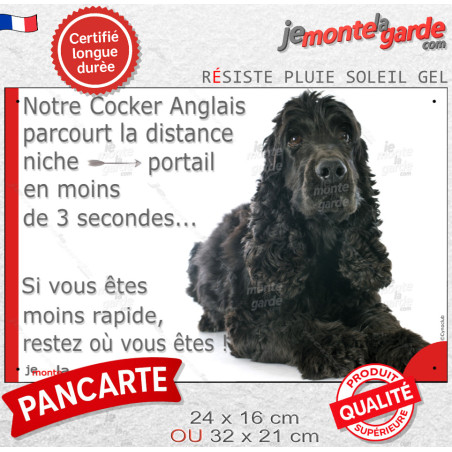 Cocker Anglais tout noir couché, plaque humour "parcourt distance niche-portail moins de 3 secondes" photo
