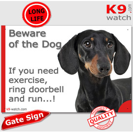 Funny black and tan smooth-haired Dachshund gate sign with doorbell joke, glossy coat and tan points for entrances and doors.