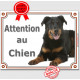 Beauceron couché, plaque "Attention au Chien" pancarte panneau Berger de Beauce noir et feu photo
