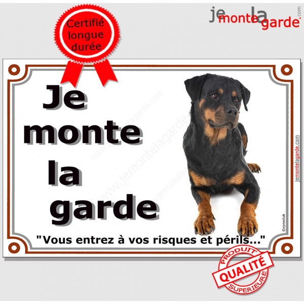 Rottweiler couché, plaque portail "Je Monte la Garde, risques et périls" pancarte panneau Rott photo
